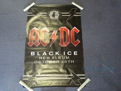 Lot 34 - AC/DC - A group of Black Ice Album Bus Stop...