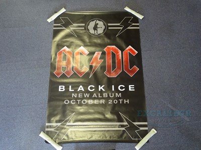 Lot 34 - AC/DC - A group of Black Ice Album Bus Stop...