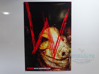 Lot 530 - SAW (2004) - A group of three one sheet movie...