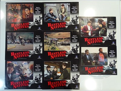 Lot 590 - RESTLESS NATIVES (1985) - A set of 8 large...