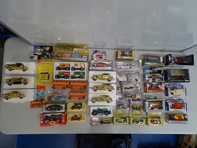 Lot 104 - A mixed group of diecast vehicles by different...