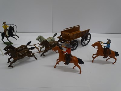 Lot 112 - A group of BRITAINS lead cowboys figures...