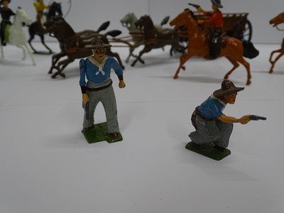 Lot 112 - A group of BRITAINS lead cowboys figures...
