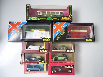 Lot 132 - A group of boxed SOLIDO cars and buses...