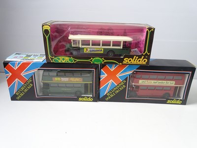 Lot 132 - A group of boxed SOLIDO cars and buses...