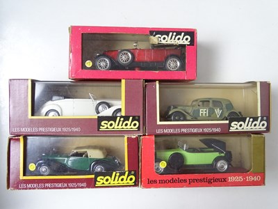 Lot 132 - A group of boxed SOLIDO cars and buses...