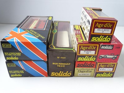 Lot 132 - A group of boxed SOLIDO cars and buses...