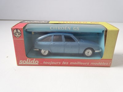 Lot 132 - A group of boxed SOLIDO cars and buses...