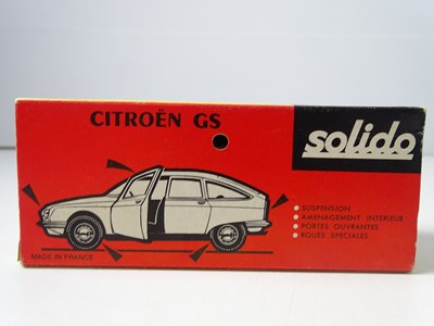 Lot 132 - A group of boxed SOLIDO cars and buses...