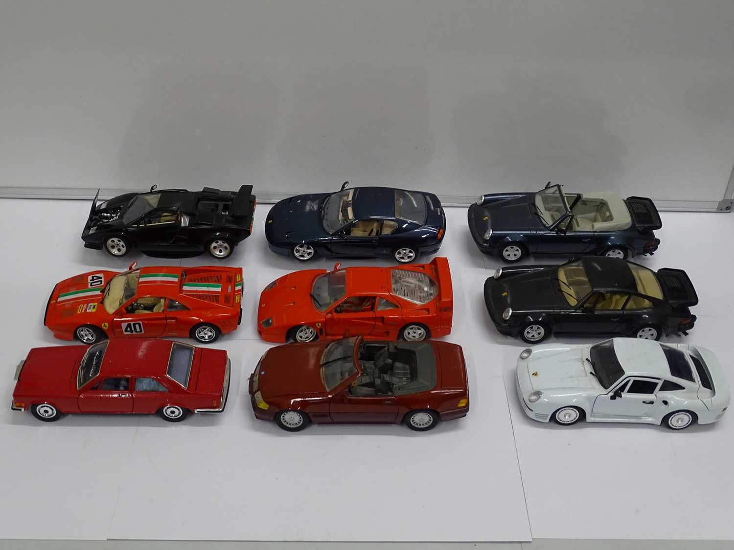 Lot 153 - A Group Of Unboxed 1:18 Scale Diecast Cars