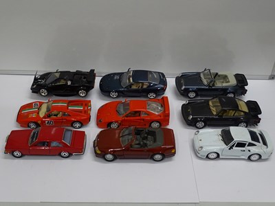 Lot 153 - A group of unboxed 1:18 scale diecast cars by...