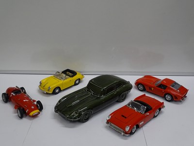 Lot 154 - A group of unboxed 1:18 scale diecast cars by...
