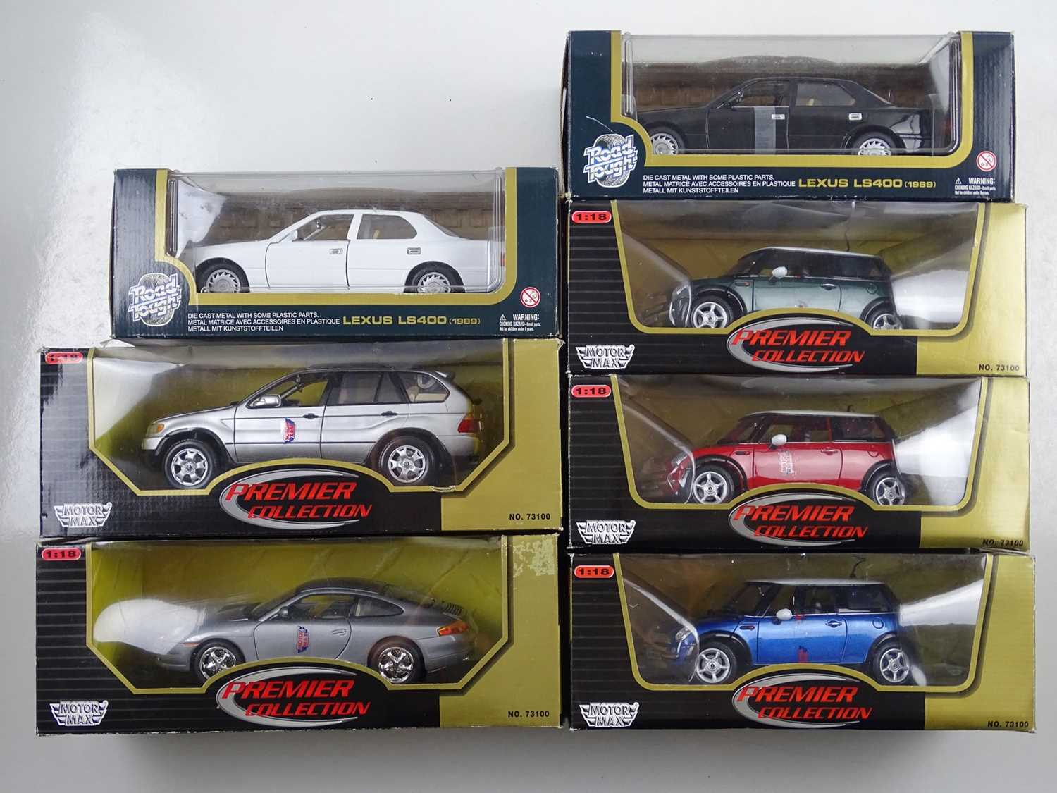 Lot 156 - A group of boxed 1:18 scale diecast cars by...