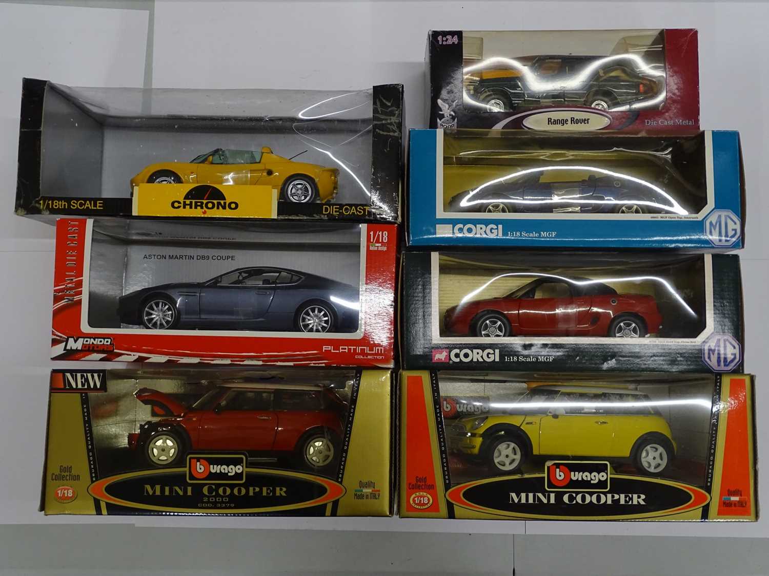 Lot 158 - A group of boxed 1:18 scale diecast cars by...