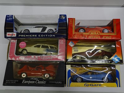 Lot 159 - A group of boxed 1:18 scale diecast cars by...