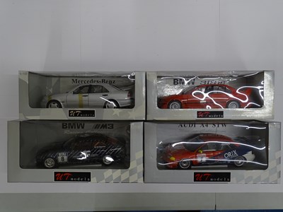Lot 163 - A group of boxed 1:18 scale diecast cars by UT...