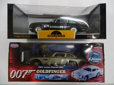 Lot 164 - A pair of boxed 1:18 scale diecast Aston...