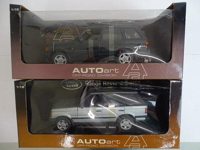Lot 168 - A pair of boxed 1:18 scale AUTOART Range Rover...