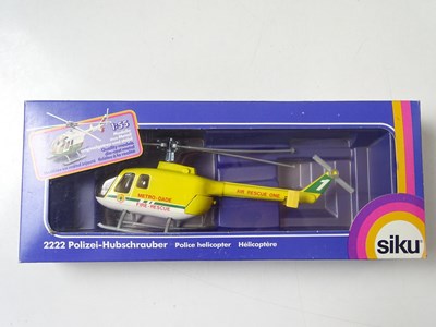 Lot 174 - A group of diecast helicopters by SIKU, SOLIDO...