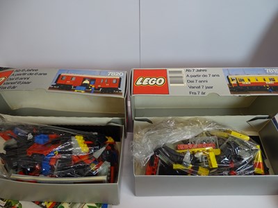 Lot 182 - A group of vintage LEGO train and track kits -...