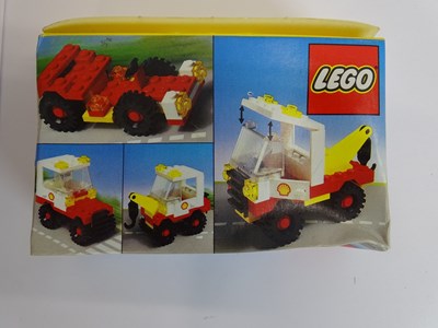 Lot 183 - A small group of vintage 1980s LEGO sets to...