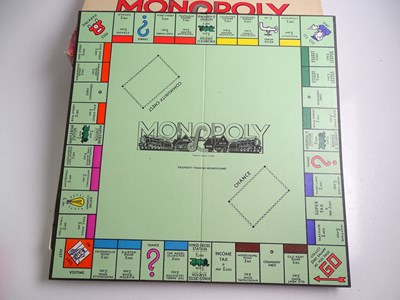 Lot 204 - A pair of vintage MONOPOLY board games -...