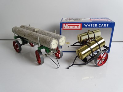 Lot 231 - An unboxed MAMOD log trailer wagon together...