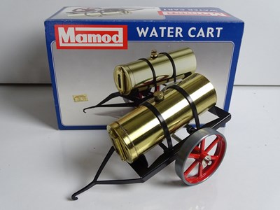 Lot 231 - An unboxed MAMOD log trailer wagon together...