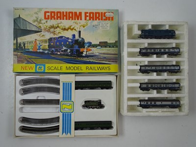 Lot 233 - A pair of vintage N gauge train sets...