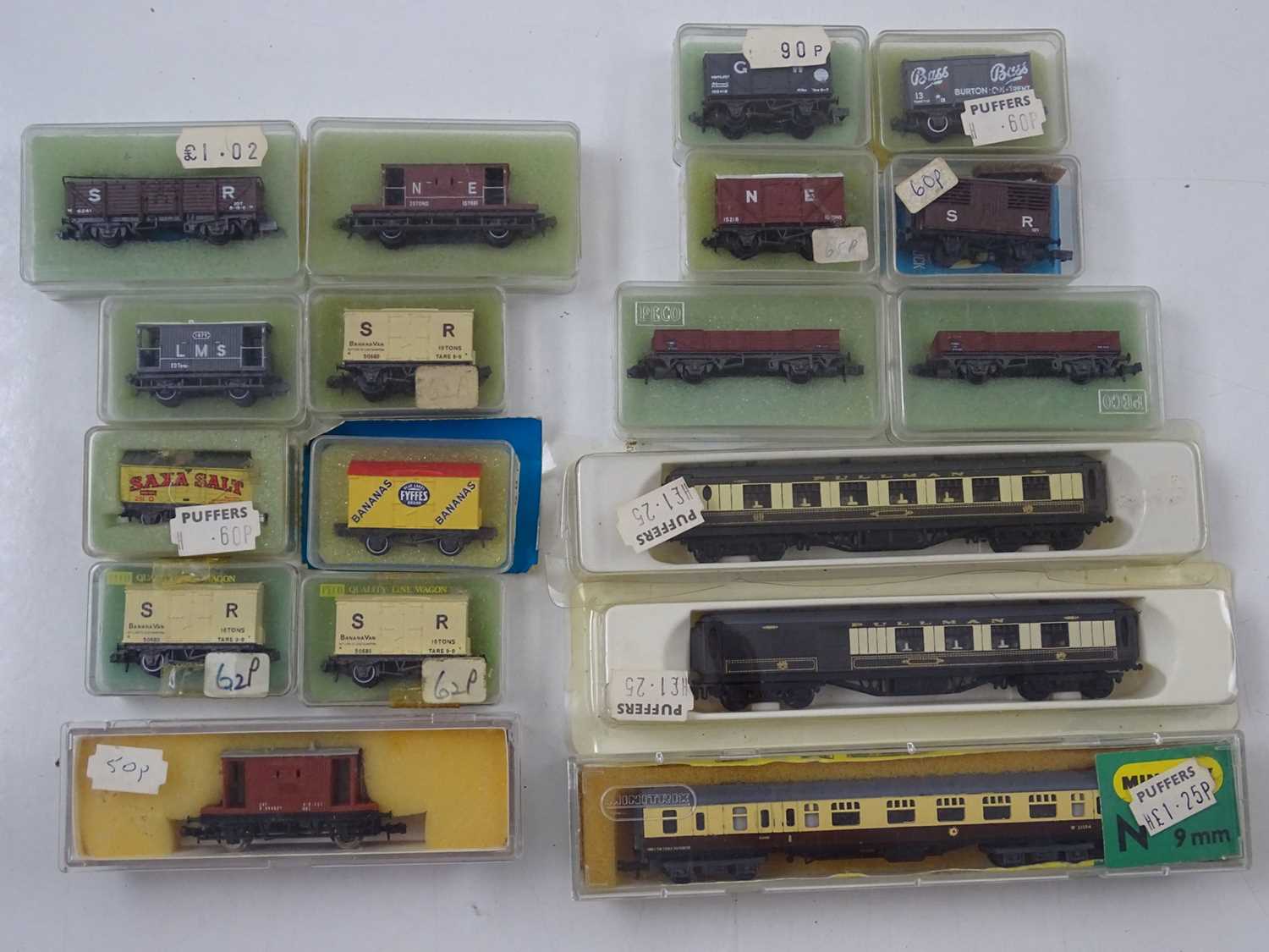 Lot 237 - A group of N gauge wagons and coaches by...