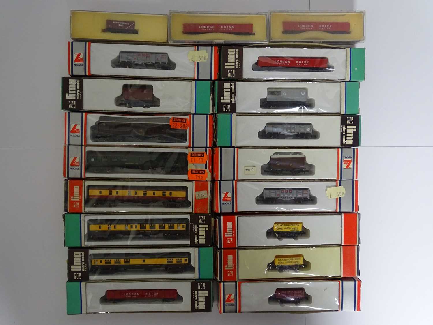 Lot 240 - A group of N gauge wagons and coaches by