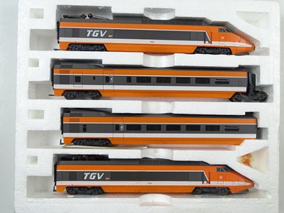Lot 283 - A LIMA HO gauge Golden Series 4-car TGV set in...