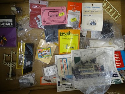 Lot 315 - A large tray of OO gauge unbuilt kits by RATIO,...