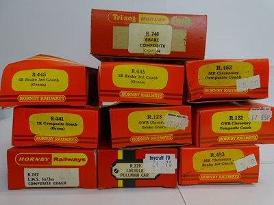 Lot 321 - A group of HORNBY OO gauge boxed coaches in...