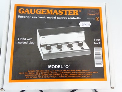 Lot 345 - A GAUGEMASTER 4-track controller together with...