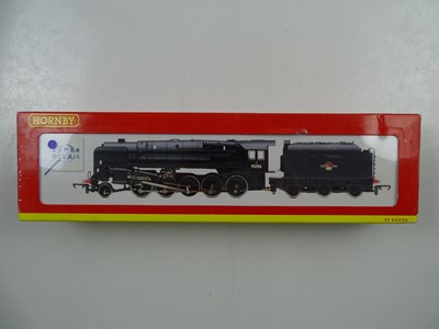 Lot 390 - A HORNBY OO gauge R2105D class 9F steam...