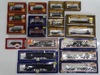 Lot 399 - A large group of mixed OO gauge wagons by...