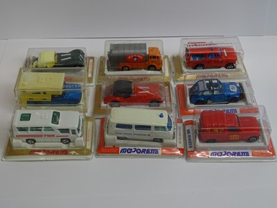 Lot 46 - A group of MAJORETTE vans and cars all sealed...