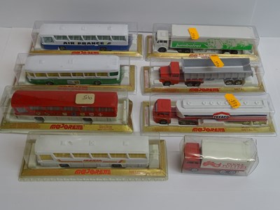 Lot 47 - A group of MAJORETTE buses and articulated...