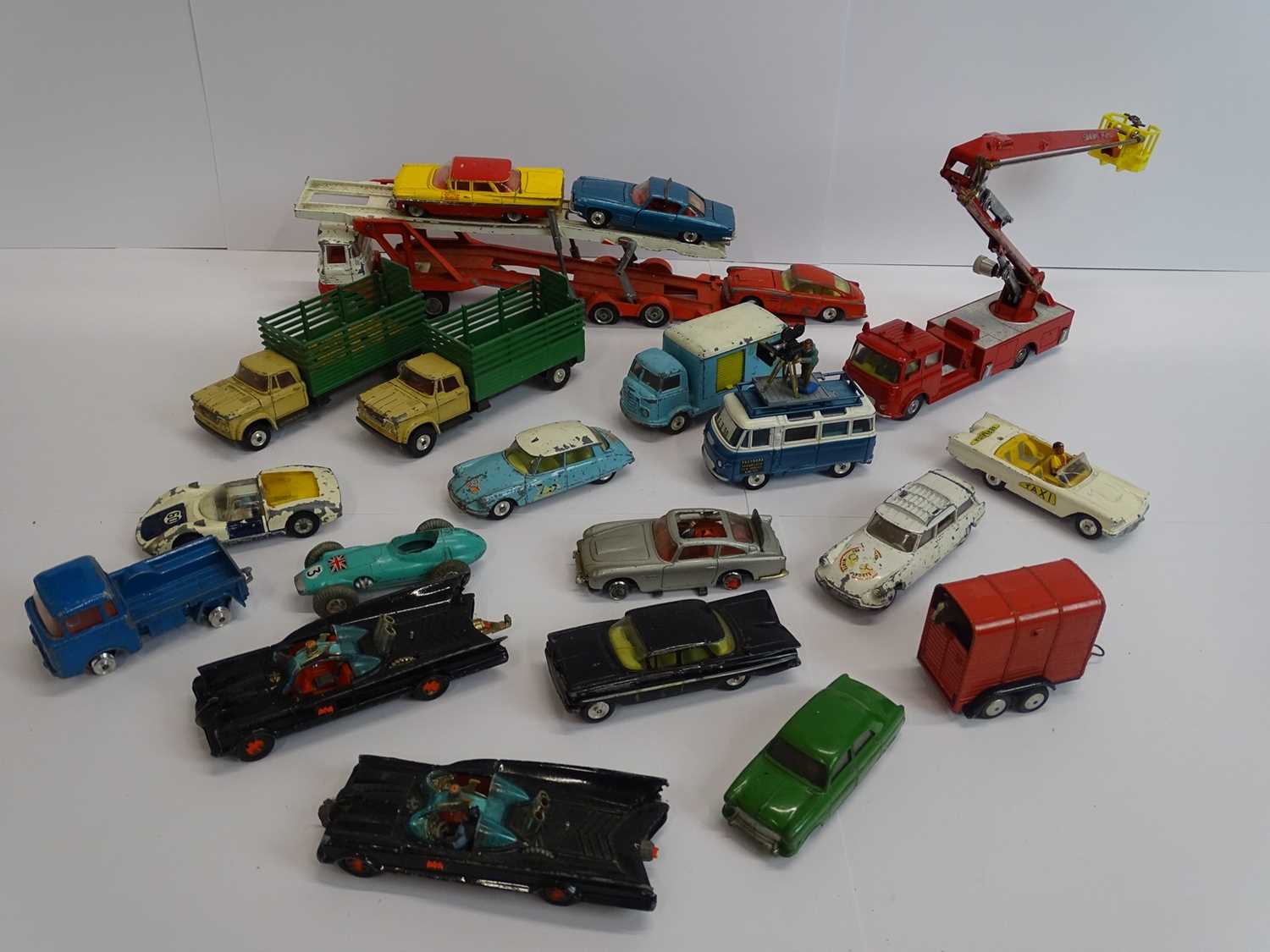 Lot 74 - A group of unboxed, playworn CORGI toys to...