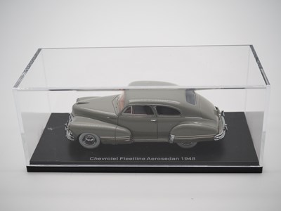 Lot 100 - A pair of 1:43 scale hand built resin models...