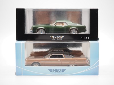 Lot 105 - A pair of 1:43 scale hand built resin models...