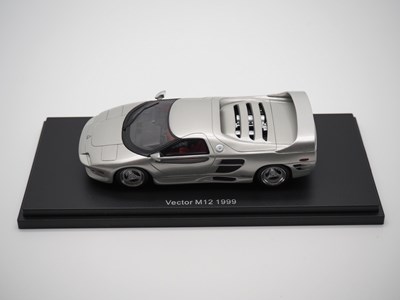 Lot 114 - A pair of 1:43 scale hand built resin models...