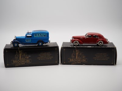 Lot 128 - A pair of 1:43 scale hand built white metal...