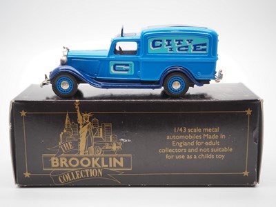 Lot 128 - A pair of 1:43 scale hand built white metal...