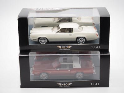 Lot 153 - A pair of 1:43 scale hand built resin models...