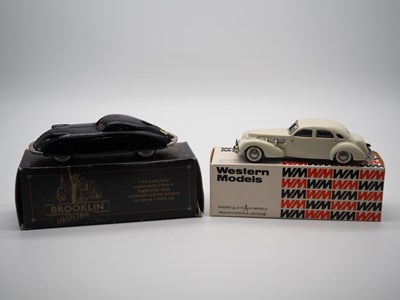 Lot 162 - A pair of 1:43 scale hand built white metal...