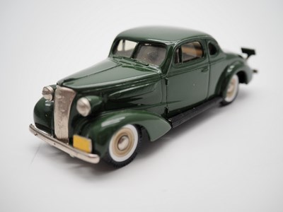 Lot 184 - A pair of 1:43 scale hand built white metal...