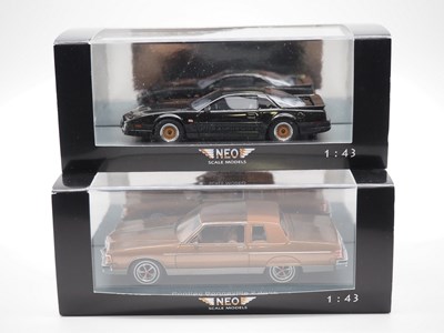 Lot 197 - A pair of 1:43 scale hand built resin models...