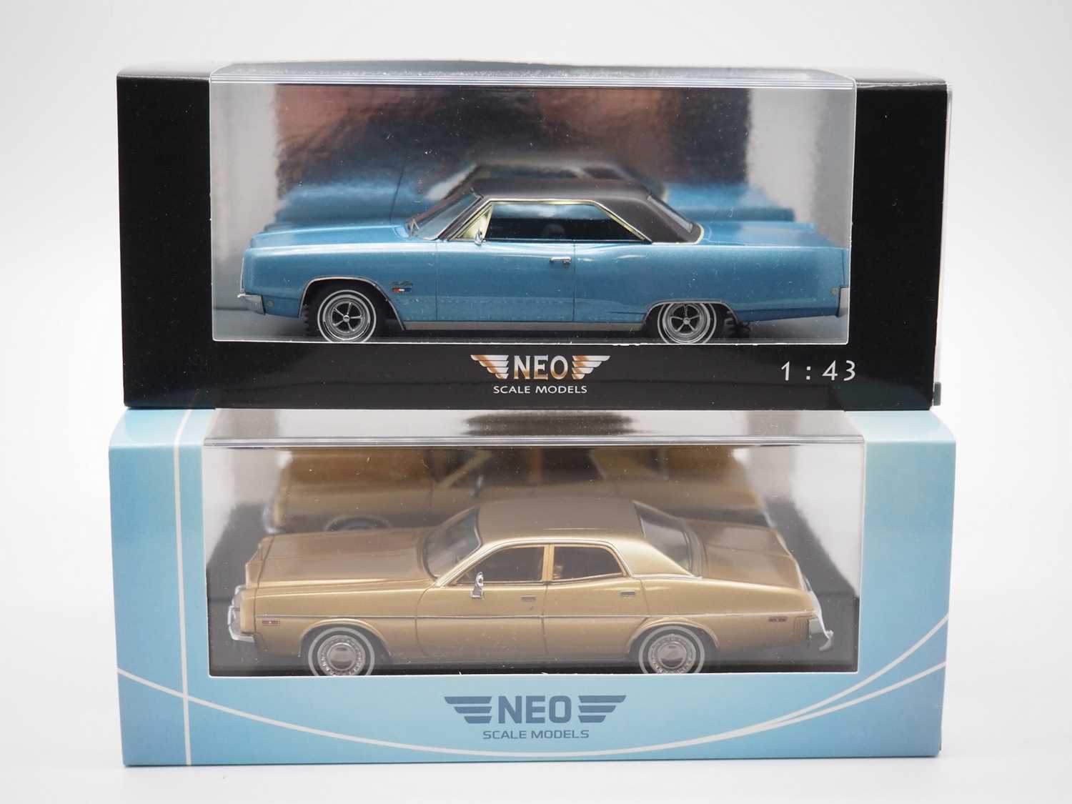 Lot 199 - A pair of 1:43 scale hand built resin models